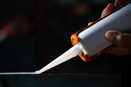 Adhesive and sealant